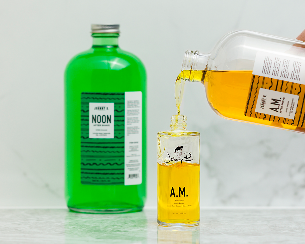 Pouring Aftershave 32oz refill into smaller jar