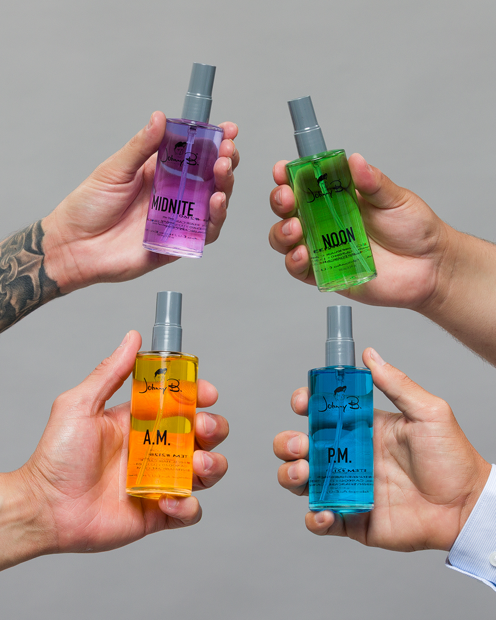 Aftershave bottles in hands
