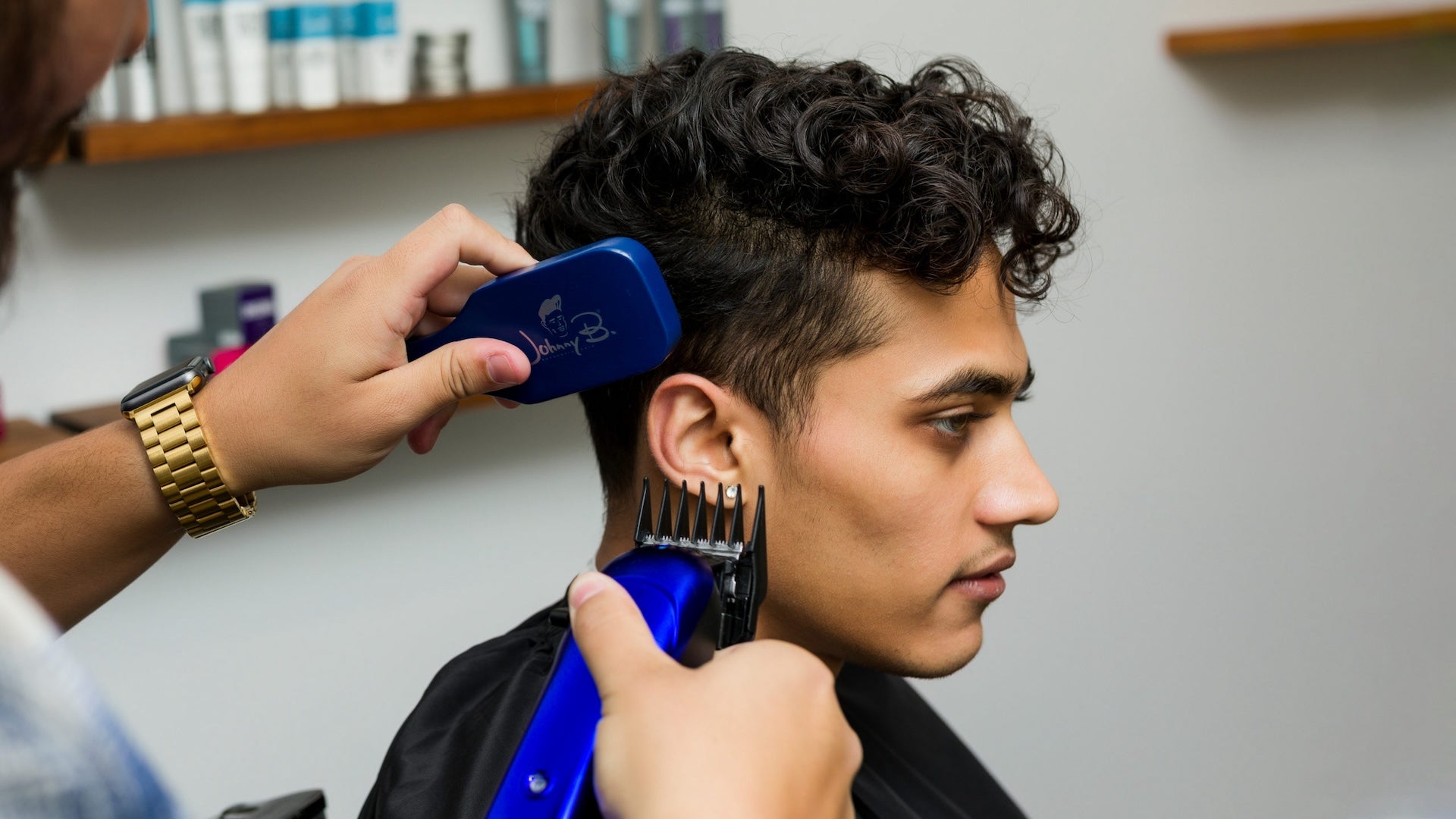 Barber cutting clients hair