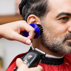 Barber with Barber Ring Brush around finger