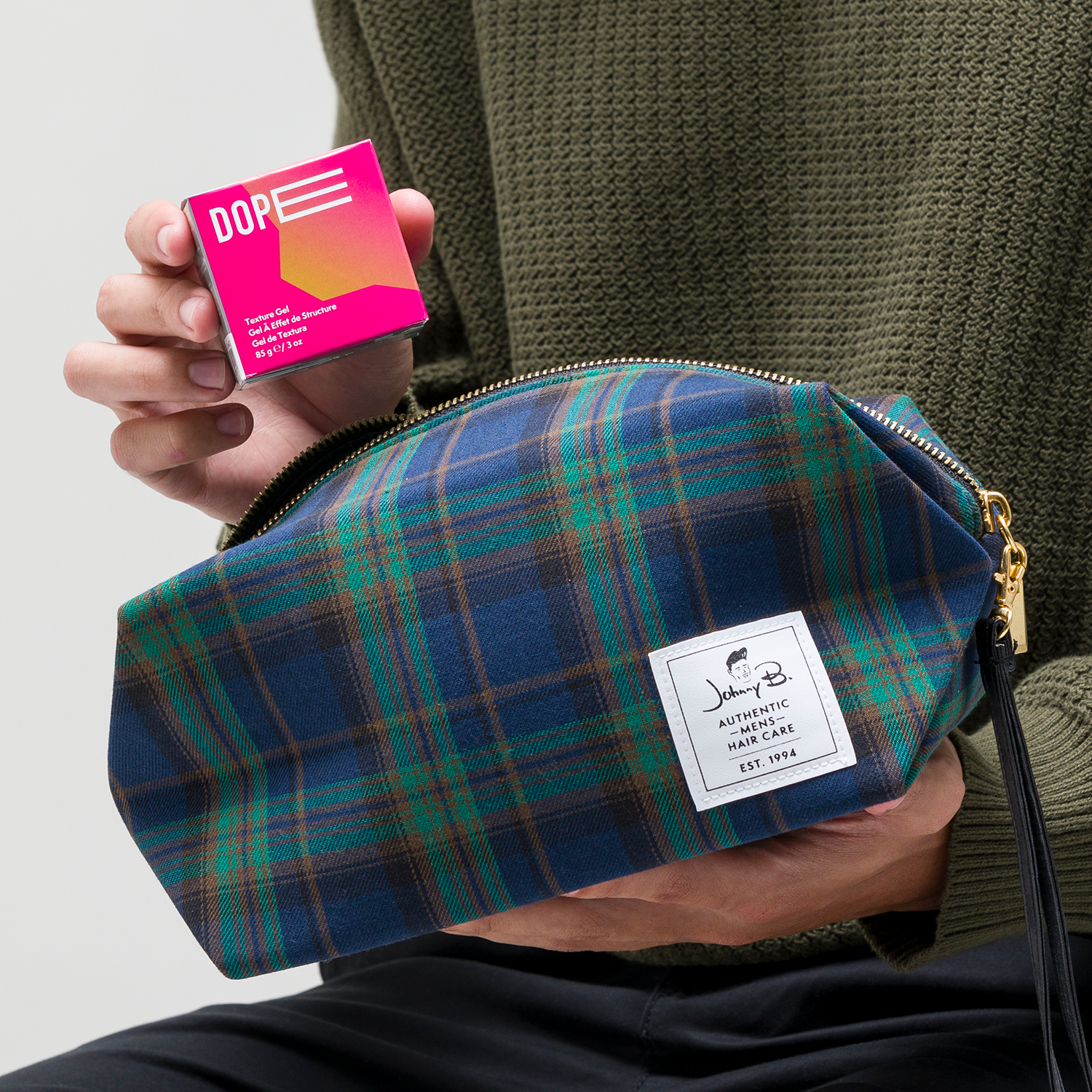 Dope 3oz being placed into Dopp Bag