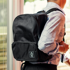 Man wearing black backpack