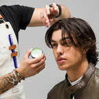 Barber applying Molding Paste to client's hair