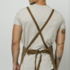 Model wearing brown Work Apron (back)