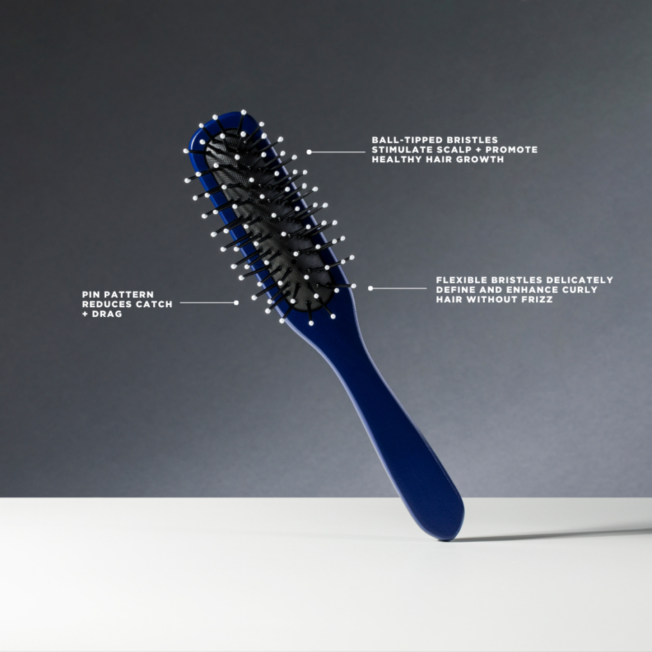 Boom brush infographic: pin pattern reduces catch and drag, flexible bristles delicately define and enhance curly hair, ball-tipped bristles stimulate scalp